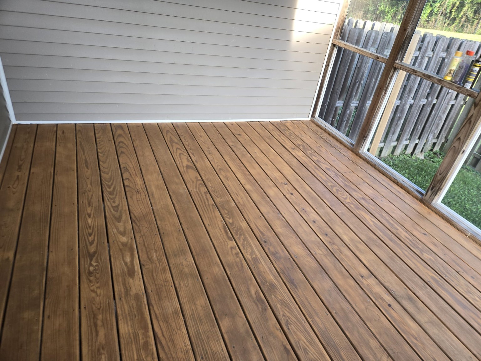 Real GF deck refinishing work showing the wood grain and finished boards